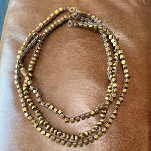 3 strands of Marisa Haskell brass and leather necklaces